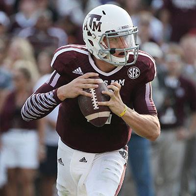 Photo: Despite a loss to Alabama last week, Johnny Manziel showed he can win the Heisman Trophy again. Who can challenge him? Our experts debate: http://yhoo.it/1eZlHu2