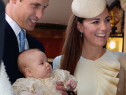 Prince William, Duke of Cambridge and Catherine, Duchess of Cambridge talk to Queen Elizabeth II (obscured) as they arrive, holding their son Prince George, at Chapel Royal in St James's Palace, ahead of the christening of the three month-old Prince George of Cambridge by the Archbishop of Canterbury on October 23, 2013 in London, England. (Photo by John Stillwell - WPA Pool /Getty Images)