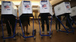 Voters fill out their ballots at a polling station on November 5, 2013 in Brooklyn.  (Photo by John Moore/Getty Images)