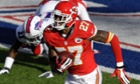 Kansas City Chiefs cornerback Sean Smith intercepts a pass from Buffalo Bills quarterback Jeff Tuel and prepares to return it 100 yards for a score.