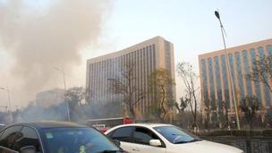 Smoke billows from the blast site on Yingze Street in Taiyuan, Shanxi Province, China, 6 November 2013