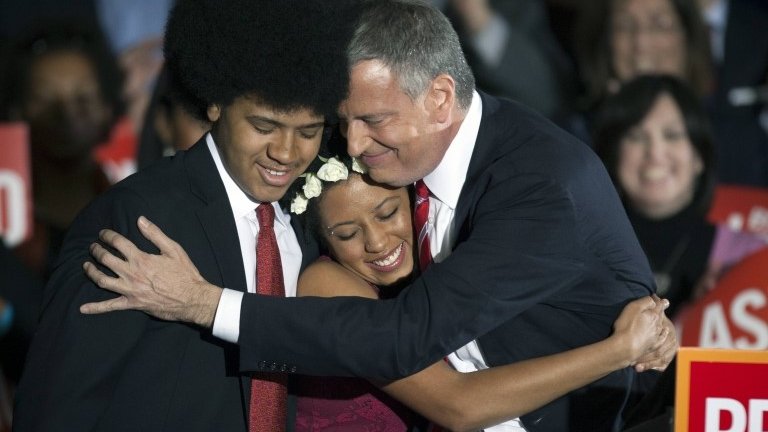 Bill de Blasio hugs his son and daughter