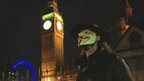 Protester in Guy Fawkes mask