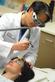 Dr. David Hom of the UC Health Facial Plastic and Reconstructive Surgery practice demonstrates a laser procedure on one of his patients.