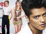 Bruno Mars beats out Miley Cyrus and Taylor Swift as he snags Billboard's Artist Of The Year 