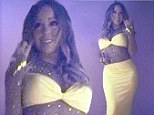 Just a little old thing she threw on! Mariah Carey posts snap wearing a tight yellow dress with rhinestone studded mesh 