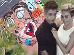 Justin Bieber pays tongue-in-cheek tribute to Miley Cyrus by spray painting a portrait of her on his skateboard ramp