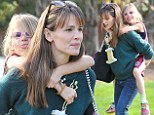 That's my girl! Jennifer Garner treats daughter Violet to a piggyback ride after she scores another trophy at soccer