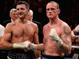 Battle: Froch (left) shakes hands with Groves during their IBF and WBA World Super Middleweight bout