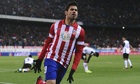 Diego Costa celebrates scoring Atletico Madrid's opener against Valencia