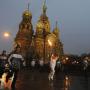 Galina Zhigunova, an employee of Baltika Breweries company, takes part in the Sochi 2014 Winter Olympic torch relay.