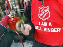 PHOTO: A donation is made as Salvation Army bell ringer Ruben Rios works outside a store as seen in this file photo taken on November 21, 2003 on the Magnificent Mile in Chicago. 