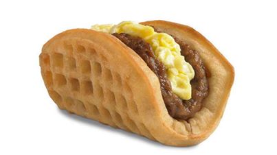 Photo: Want a Waffle Taco? Taco Bell is readying for the launch of its national breakfast menu on March 27, with items such as the A.M. Crunchwrap designed to appeal to its fan base of younger men. And the chain says breakfast will be available until 11 a.m. - a half hour longer than McDonald's offers its Egg McMuffins. http://trib.al/BaEPHuI 

(Photo: AP)