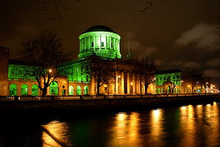 The Four Courts goes Green for Saint Patricks Day in Dublin