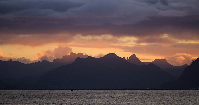 Sailboat in Lofoten sunset, Norway.