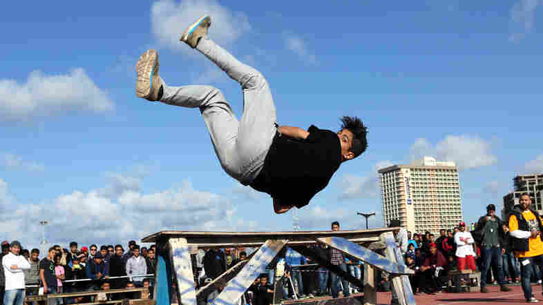 A Libyan youth displays his skills in parkour during a friendly competition in Tripoli in March.