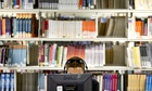 student in library