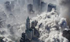 View from a helicopter as smoke and ash engulf lower Manhattan on 9/11.