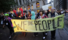 Members of Occupy Wall Street celebrate after learning they can stay in Zuccotti Park in New York