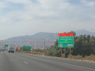 Interstate 10 Westbound Desert Cities - Sonny Bono Memorial Freeway reminds motorists reminding you safely to know "Putting America to Work, Project Funded by Caltrans and the America Recovery and Re-Investment Act" with this roadside sign followed by