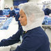 Workers assemble personal protection kits at a Medline plant in Illinois. Makers of protective equipment say demand has spiked, as hospitals brace for potential Ebola cases.