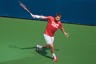 Stan Wawrinka hitting a topspin backhand in Toronto.