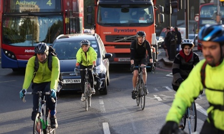The way it is now: cyclists in rush hour traffic near Waterloo Station in London.