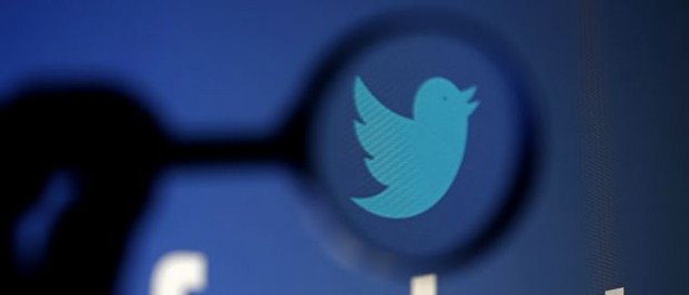 A logo of Twitter is pictured next to the logo of Facebook in this illustration photo in Sarajevo