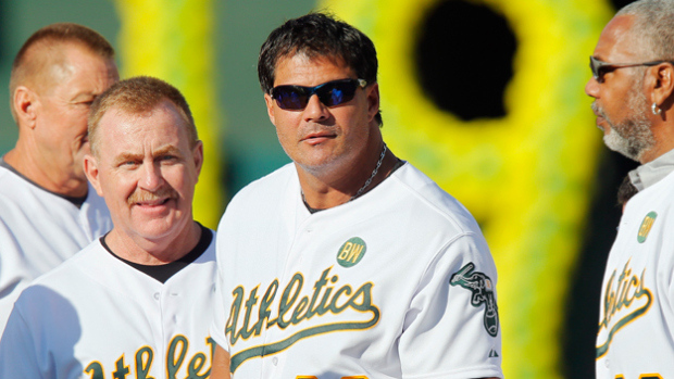 Jose Canseco joins his former A’s teammates as they celebrate their World Series championship 25 years ago, before a game against the Baltimore Orioles at O.co Coliseum on July 19, 2014 in Oakland, California. (Photo by Brian Bahr/Getty Images)