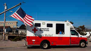 In the aftermath of Superstorm Sandy, a former Red Cross official says, as many as 40 percent of the organization's emergency vehicles were assigned for public relations purposes. This photo, which shows one of the trucks in Long Island, N.Y., in January 2013, is one example of the many publicity photos taken by the Red Cross.