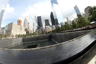 Many elements of the World Trade Center site are visible among the White Oaks of the Memorial Plaza.