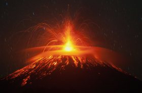 Mount Slamet spews lava and gas during its eruption as seen from Pandansari village in Brebes, Central Java, Indonesia on Sept. 18, 2014.