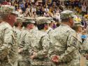 Members of the 193rd Military Police Battalion received a farewell from their family and friends at the Douglas County Events Center on Oct. 21, 2014, as they departed for their year-long detainee operations mission in Guantanamo Bay, Cuba. The members will spend a year away from their families and civilian employers. Many of the unit members work as civilian law enforcement officers and corrections officers in their fulltime jobs, which contributes to their readiness and experience. (U.S. Air National Guard Photo by Capt. Darin Overstreet /RELEASED)