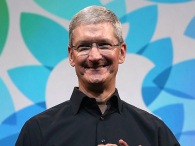 Apple CEO Tim Cook holds the iPad Air during an Apple announcement at the Yerba Buena Center for the Arts on October 22, 2013 in San Francisco, California. (credit: Justin Sullivan/Getty Images)