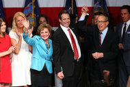 Gov. Andrew M. Cuomo, center, after his victory on Tuesday night.