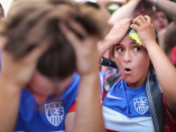 CHICAGO, IL - JUNE 22: Fans in Grant Park react after Portugal tied the U.S. in a Group G World Cup soccer match with seconds left on June 22, 2014 in Chicago, Illinois. Fans were turned away from the free event after a 10,000-person capacity was reached. (credit: Scott Olson/Getty Images)