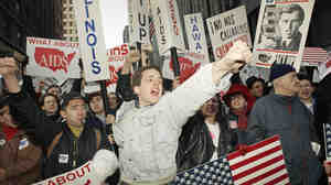 Members of the activist group ACT UP, which has fought for the rights of people with AIDS, held a demonstration in New York's Times Square in 1992.