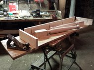 The components of a sideboard, including a field-sawn hickory plank from a fallen tree.