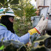 Courtney Lupinek, a Baltimore Gas and Electric employee, replaces an old-style electric meter with a new “smart meter” in Owings Mills, Md.