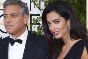 
Erst die Arbeit, dann das wahre Leben: Amal Clooney (r.) und Ehemann bei der Verleihung der Golden Globes in Beverly hills
