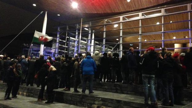 Crowds begin to gather at the Senedd