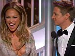 11 January 2015 - Los Angeles - USA  **** STRICTLY NOT AVAILABLE FOR USA ***  Jeremy Renner stuns Jennifer Lopez with raunchy comment about her breasts as they present an award at the Golden Globes. The pair were on stage to announce the winner of the Best Actor in a TV Mini Series or Movie when Renner made the shocking comment. Lopez was holding the envelope with the winner's name when Renner asked her: "You wanna open it?" J-Lo replied:" You want me to? I've got the nailsfor it." And without missing a beat as he stared as her chest Renner quipped:" You've got the Globes too!" Lopez looked momentarily stunned before shrugging and then playfully hitting Renner with the winner's envelope. She then announced the winner - Billy Bob Thornton.   XPOSURE PHOTOS DOES NOT CLAIM ANY COPYRIGHT OR LICENSE IN THE ATTACHED MATERIAL. ANY DOWNLOADING FEES CHARGED BY XPOSURE ARE FOR XPOSURE'S SERVICES ONLY, AND DO NOT, NOR ARE THEY INTENDED TO, CONVEY TO THE USER ANY COPYRIGHT OR LICENSE IN THE MATER