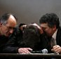 epa04558479 The new editor-in-chief of French satirical magazine Charlie Hebdo, Gerard Biard (L), and Journalist Patrick Pelloux (R) comfort caricaturist Luz (C) during a press conference about the next Charlie Hebdo edition, at the Liberation newspaper headquarters, in Paris, France, 13 January 2015. Charlie Hebdo, the French satire magazine attacked by gunmen on 07 January, will feature cartoons of the prophet Mohammed in its next edition, to be published on 14 January. It will have a print run of 3 million, media reports said, up from an earlier announced run of 1 million, and far in excess of the weekly magazine's usual circulation of 60,000.  EPA/YOAN VALAT