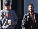 EXCLUSIVE COLEMAN-RAYNER, Calabasas, CA, December 25th, 2014. 
Bruce Jenner and his son Brandon both sport pony tails as they're seen grabbing coffee at Starbucks in Calabasas. Bruce later fills up his Porsche with gas. The former athlete was with his son Brandon while wearing a Princeton track and field sweater and a Redbull air race hat. 
CREDIT LINE MUST READ: Coleman-Rayner.
Tel US (001) 310-474-4343- office
www.coleman-rayner.com