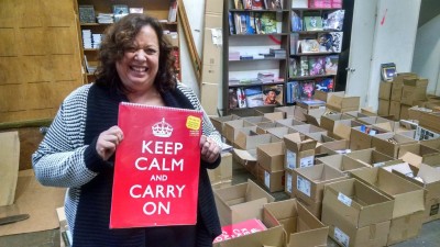 Pegasus Books owner Amy Thomas with just a few of the calendars on sale.