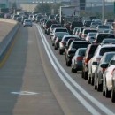 A high-occupancy-vehicle lane next to congested traffic.