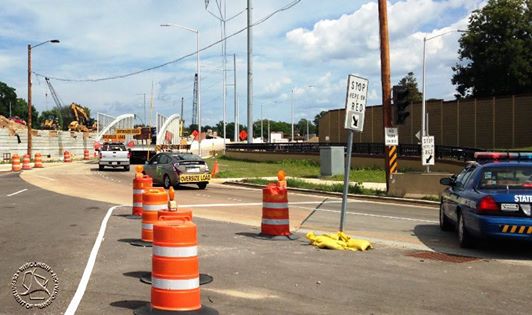 'On Wednesday afternoon, July 22, 2015, two oversize/overweight trucks delivered the first sections of the steel arch structure for the new pedestrian overpass on the Beltline, between Verona Road and Seminole Highway. Countless people were involved in its safe delivery.'