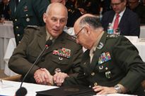 U.S. Marine Corps Gen. John Kelly, commander of U.S. Southern Command, left, greets Gen. José De Nardi, chief of the Brazilian Armed Forces Joint Staff, after delivering remarks during the opening ceremony for the 2015 South American Defense Conference in Asunción, Paraguay, Aug. 19, 2015.