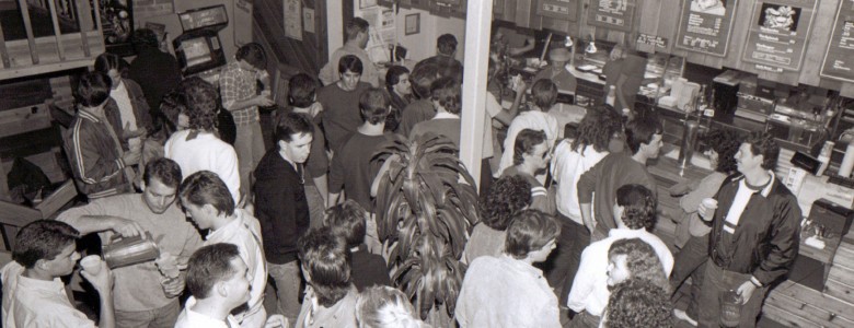 University of North Texas students wait in line to order food at the Flying Tomato, c. 1980s.