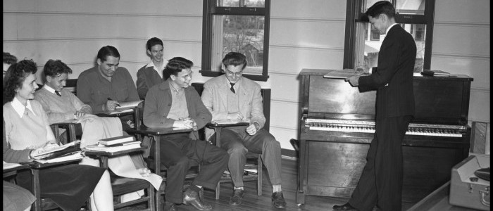 Photograph of Floyd Graham, North Texas music professor, in front of his class.